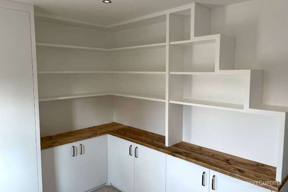 Fitted storage unit made with MDF wood for a house in Nine Elms